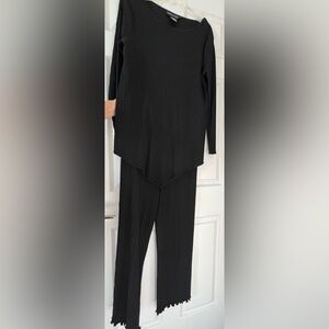 Andrea Jovine Pant Set Elegant Black Women's 2 piece set. Top is M. Pant is L